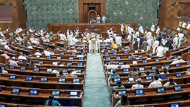Opposition members protest in the well amid proceedings in the Lok Sabha during the Monsoon session of Parliament, in New Delhi, Friday, July 24, 2026. (Sansad TV via PTI Photo)