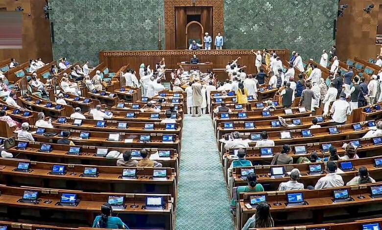 Opposition members protest in the well amid proceedings in the Lok Sabha during the Monsoon session of Parliament, in New Delhi, Friday, July 24, 2026. (Sansad TV via PTI Photo)