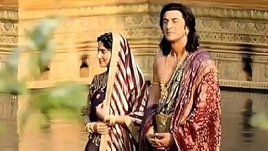 Ranbir Kapoor and a woman in traditional Indian attire at a historical site.