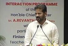 Man speaking at a podium during an interaction programme event
