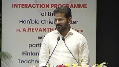 Man speaking at a podium during an interaction programme event