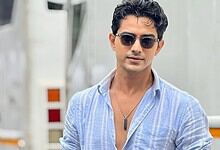 TV actor Rohit Chandel in casual attire with sunglasses, during a public appearance.