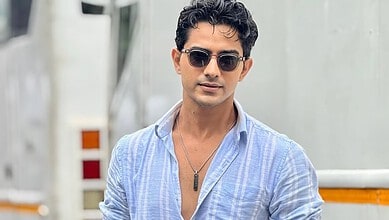 TV actor Rohit Chandel in casual attire with sunglasses, during a public appearance.
