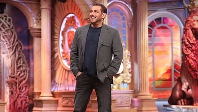 Bigg Boss 20 logo unveiled with a smiling man in a studio setting.
