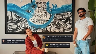 Sonakshi Sinha and a man with coffee mugs in front of artwork featuring Kalma and Gayatri Mantra.