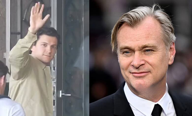 Christopher Nolan and Tom Holland at 'The Odyssey' Mumbai premiere, smiling and waving.
