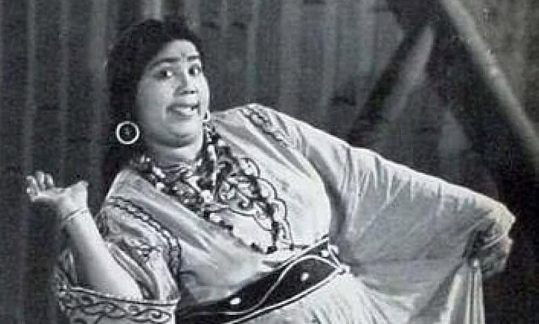 Black and white image of Tun Tun, India's first female comedian, smiling and posing.