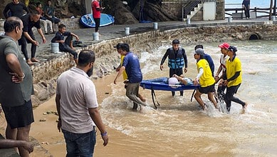 Rescue personnel carry out operations after a speedboat carrying Indian tourists capsized near Hon May Rut Ngoai off Phu Quoc Island, Vietnam, on Saturday, July 11. (PTI Photo)