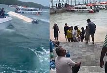 People enjoying boat ride and beach activities at Siasat Daily location in a coastal area.