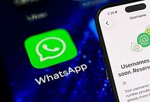 Smartphone screen showing WhatsApp message about upcoming username feature.