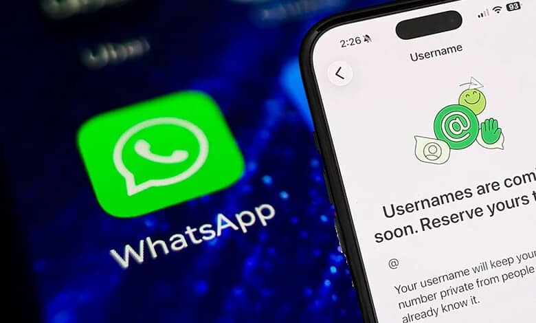 Smartphone screen showing WhatsApp message about upcoming username feature.