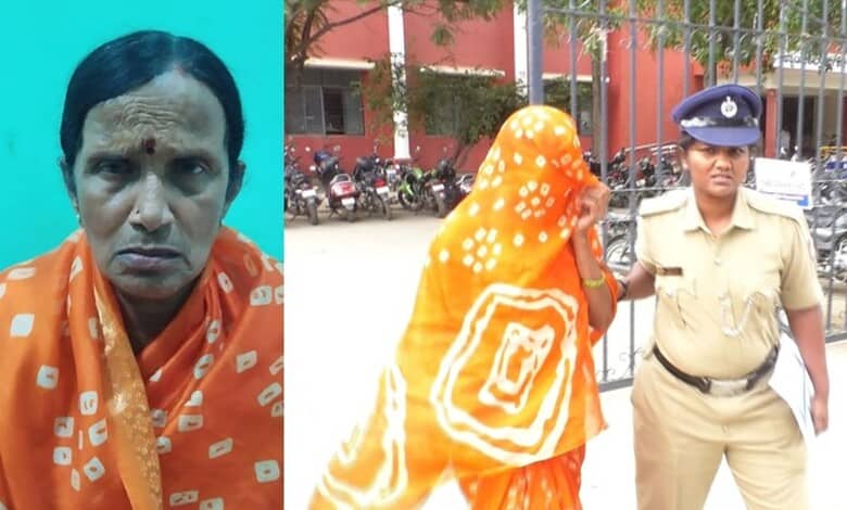 Woman in orange saree being escorted by police officer outside a building in Karnataka.