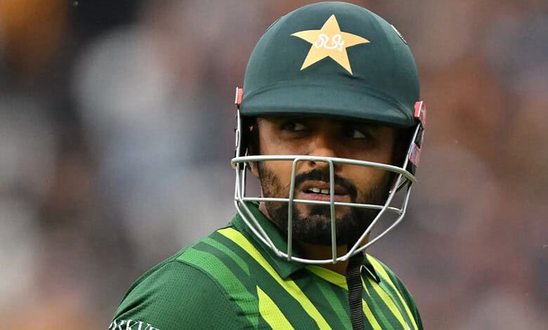 Pakistani cricketer Babar Azam in cricket gear during a match.