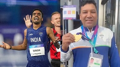 Indian athlete Singh with medal, smiling, at a sports event, celebrating success.