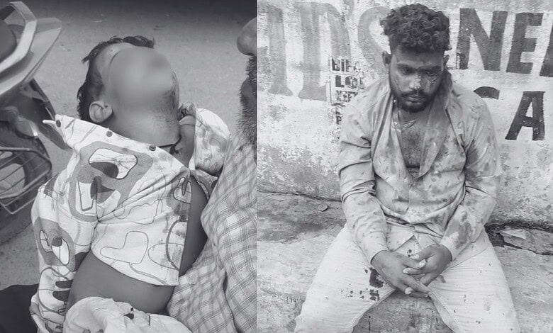 Man sitting on the ground with a young girl, both appear distressed, in an urban setting.