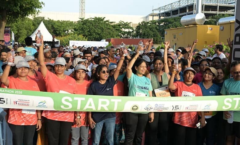 Large group of runners at the start line of the Cyberabad 5K Run event.