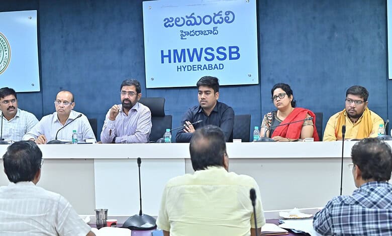 Hyderabad Water Board officials and members at a meeting discussing water management strategies.