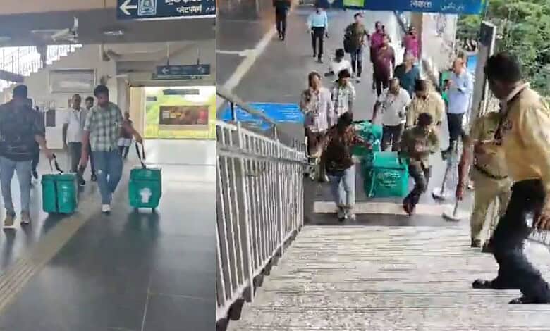 People at Hyderabad metro station with luggage and bags, busy transit scene.