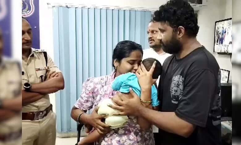 Police and family members reunite with abducted baby in Hyderabad.