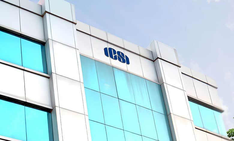 New ICSI chapter office building in Hyderabad with modern glass facade and clear sky background.