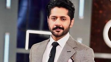 Pakistani actor Imran Ashraf in a professional studio portrait.