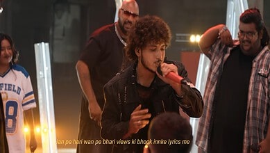Hyderabad's KNSS performs with fiery lyrics in a live event, captivating the audience.