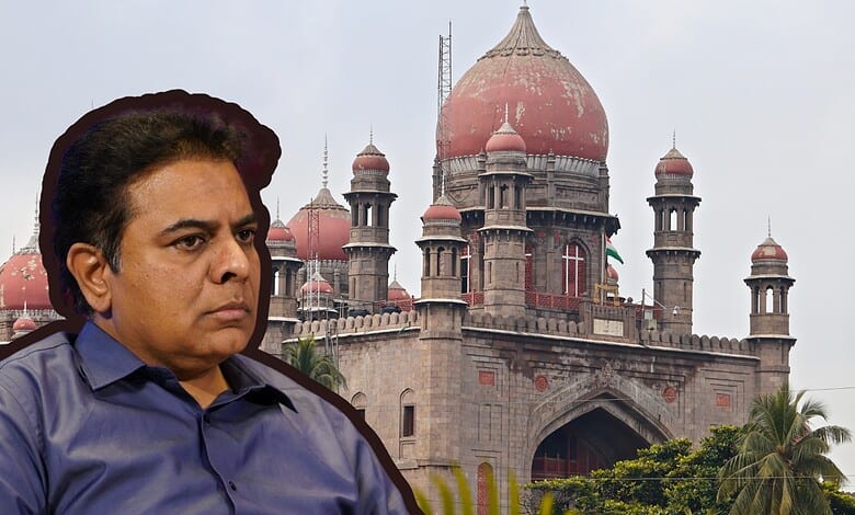 K. T. Rama Rao (KTR) in front of historic red sandstone building with domes and minarets.