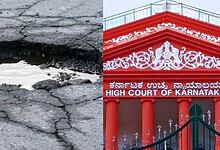 Close-up of a large pothole on a cracked road surface with water inside.