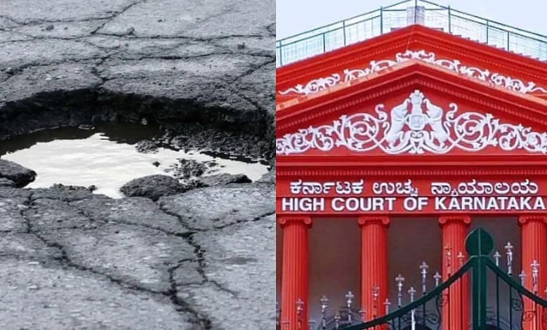 Close-up of a large pothole on a cracked road surface with water inside.