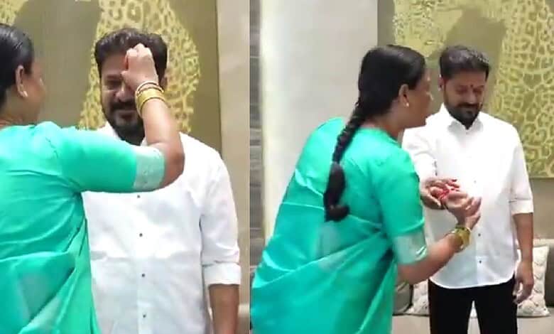 Konda Surekha and Seethakka tie rakhi to the Chief Minister during a political event.