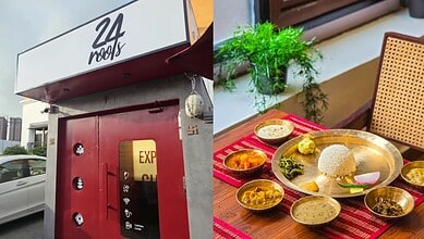 Exterior of 24 Roots restaurant with a red and white sign in Hyderabad.