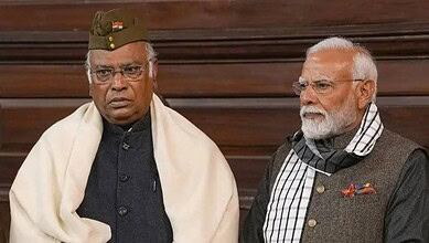 Indian Prime Minister Narendra Modi and another leader at a formal event.