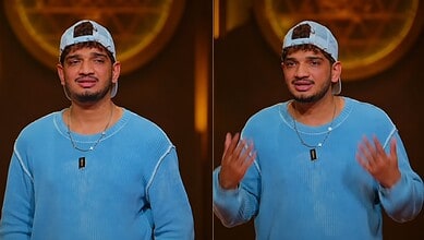 Young man in blue sweater and cap speaking emotionally on stage at The Siasat Daily event.