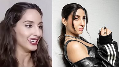 Nora Fatehi in a black leather outfit with a confident pose and intense gaze.