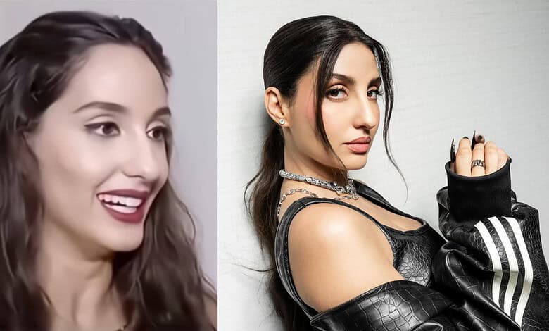 Nora Fatehi in a black leather outfit with a confident pose and intense gaze.