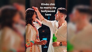 A man and woman at a celebration, with the man touching the woman's face, captioned 'Kinda chic to marry.