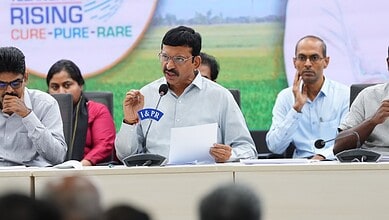 Telangana minister speaking at a press conference about registration clearance progress.