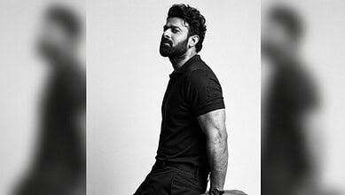 Prabhas poses with Hyderabad doctor, showing a serious expression in a black t-shirt.