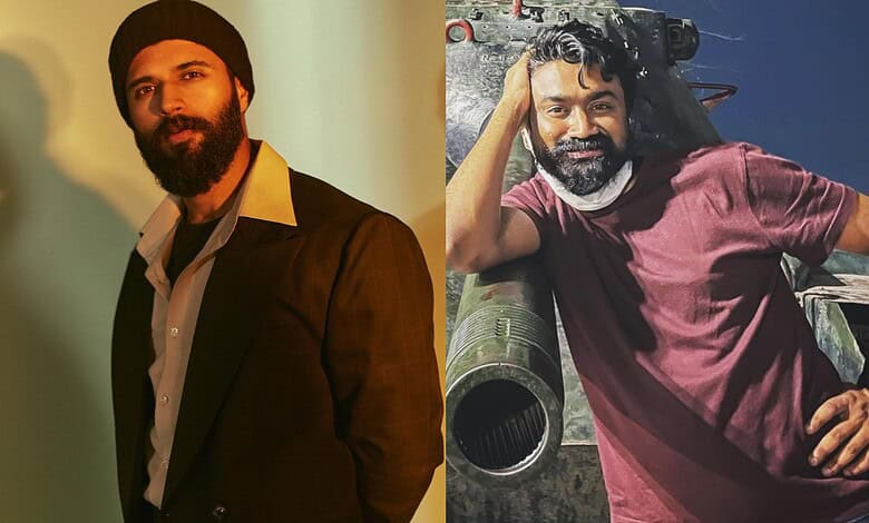 Rahul Ramakrishna and Vijay Deverakonda posing for photos at an event.