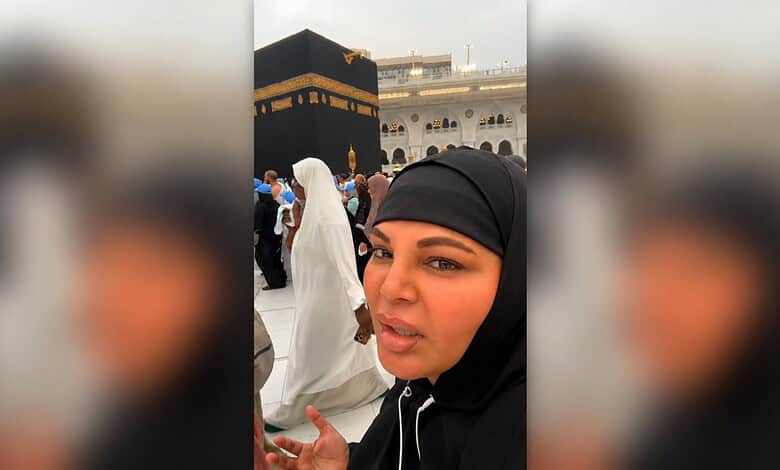 Rakhi Sawant in black hijab praying at the holy site in Mecca during her visit.