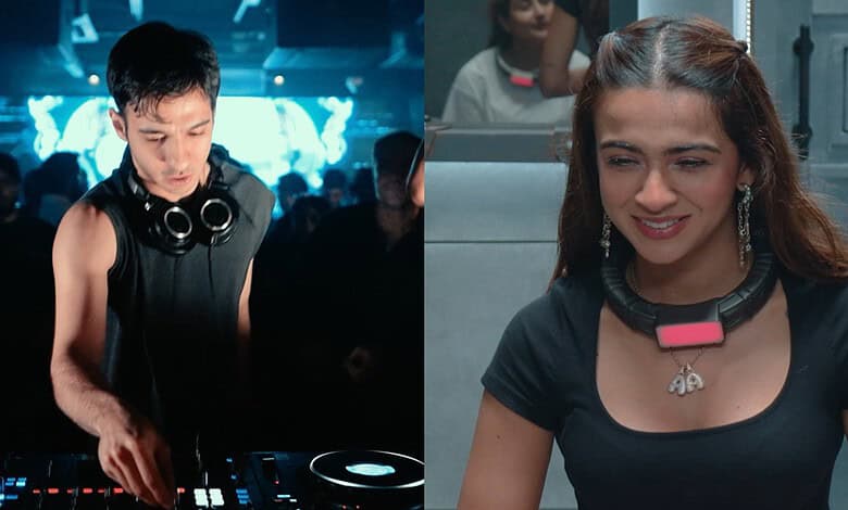 Rebel Kid DJ performing at a nightclub with a woman smiling nearby.