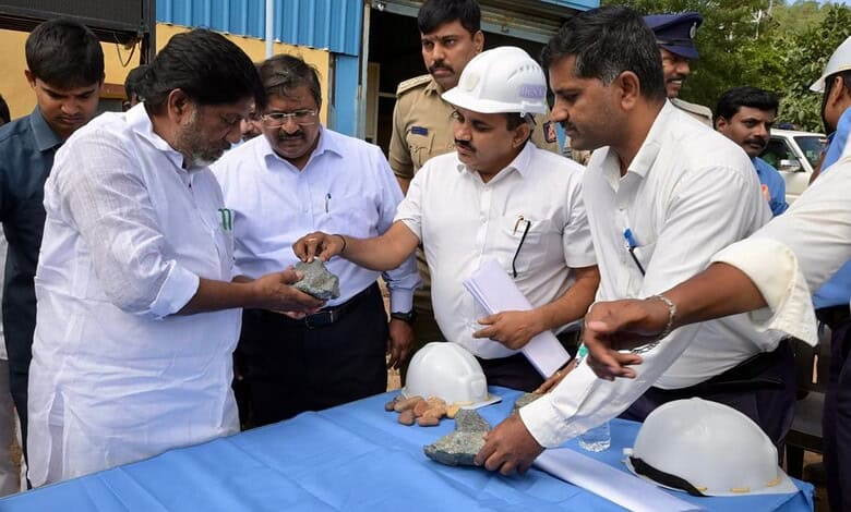 Officials and engineers discussing mineral exploration and joint ventures in Telangana.