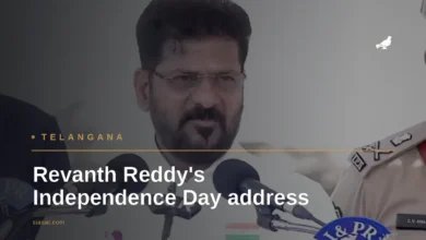 Telangana CM Revanth Reddy delivering Independence Day address with microphone and police officer nearby.