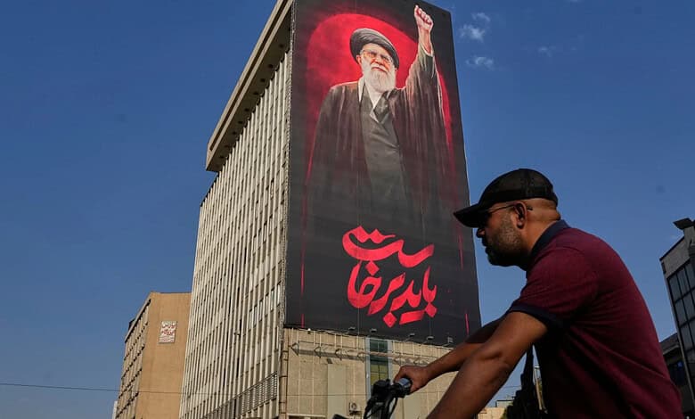 Iran chief threatens neighbours against economic measures