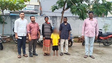 Group of people, including children, standing outdoors in Hyderabad during Operation Muskan rescue.