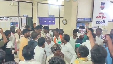 Crowd gathered inside Sangareddy police station amid protests and media coverage.