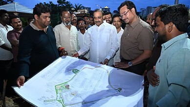 Officials and community members discuss the mini pond project for Ganesh idol immersion in Kukatpally.