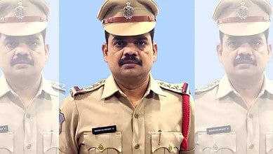 Suspended Jubilee Hills CI in police uniform with a serious expression.