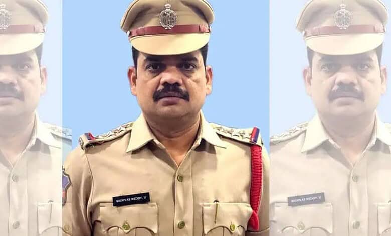 Suspended Jubilee Hills CI in police uniform with a serious expression.