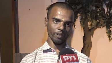 Hyderabad Rapido rider speaks into microphone amid daily struggles, with a tree in the background.